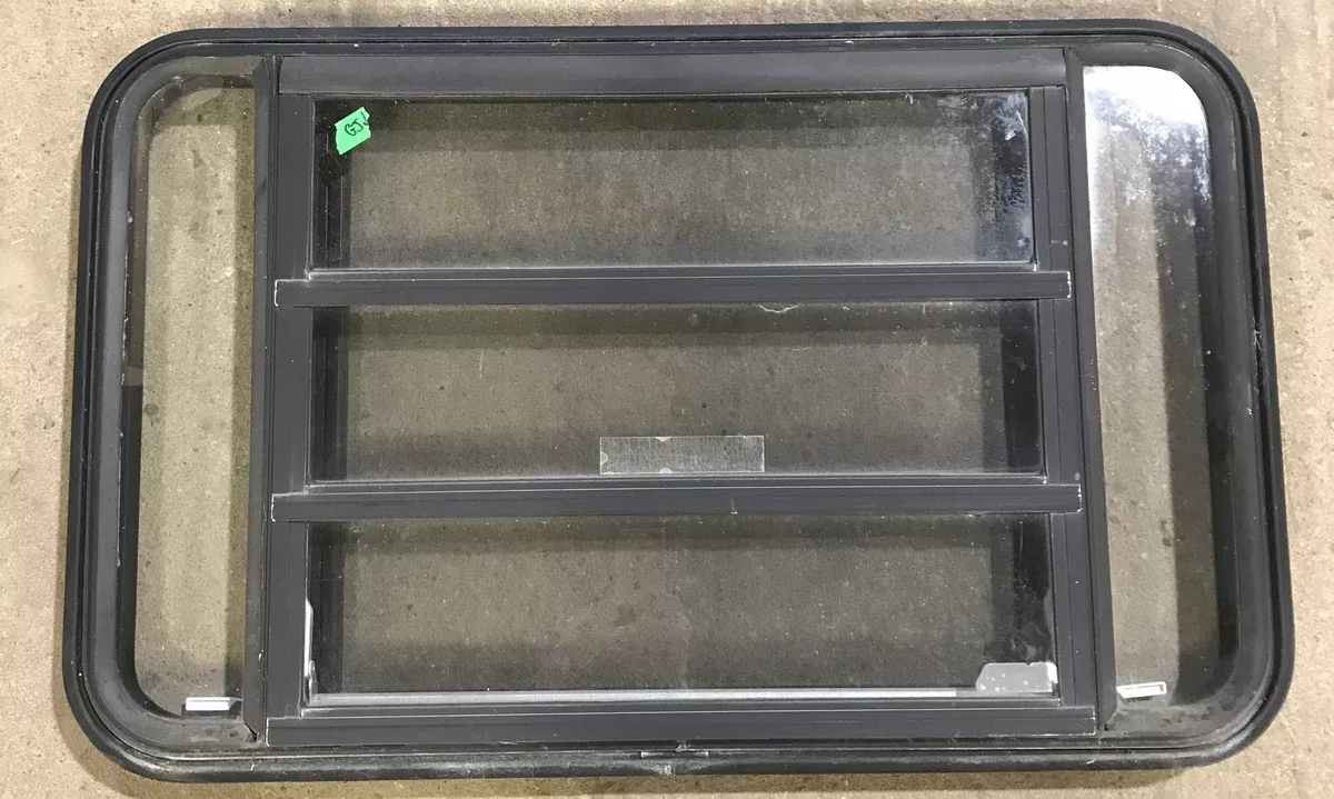 Used Black Radius Emergency Opening Window : 35 1/4″ W x 21 1/4″ H x 1 7/8″ D