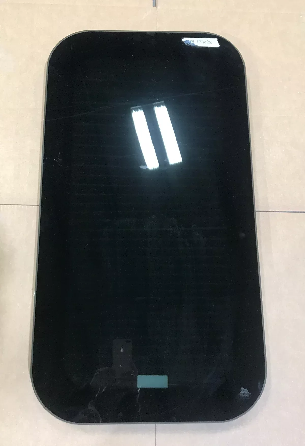 Used Black Radius Frameless Non-Opening Window : 34 1/2″ X 17 1/4″ X 1 1/2″ D