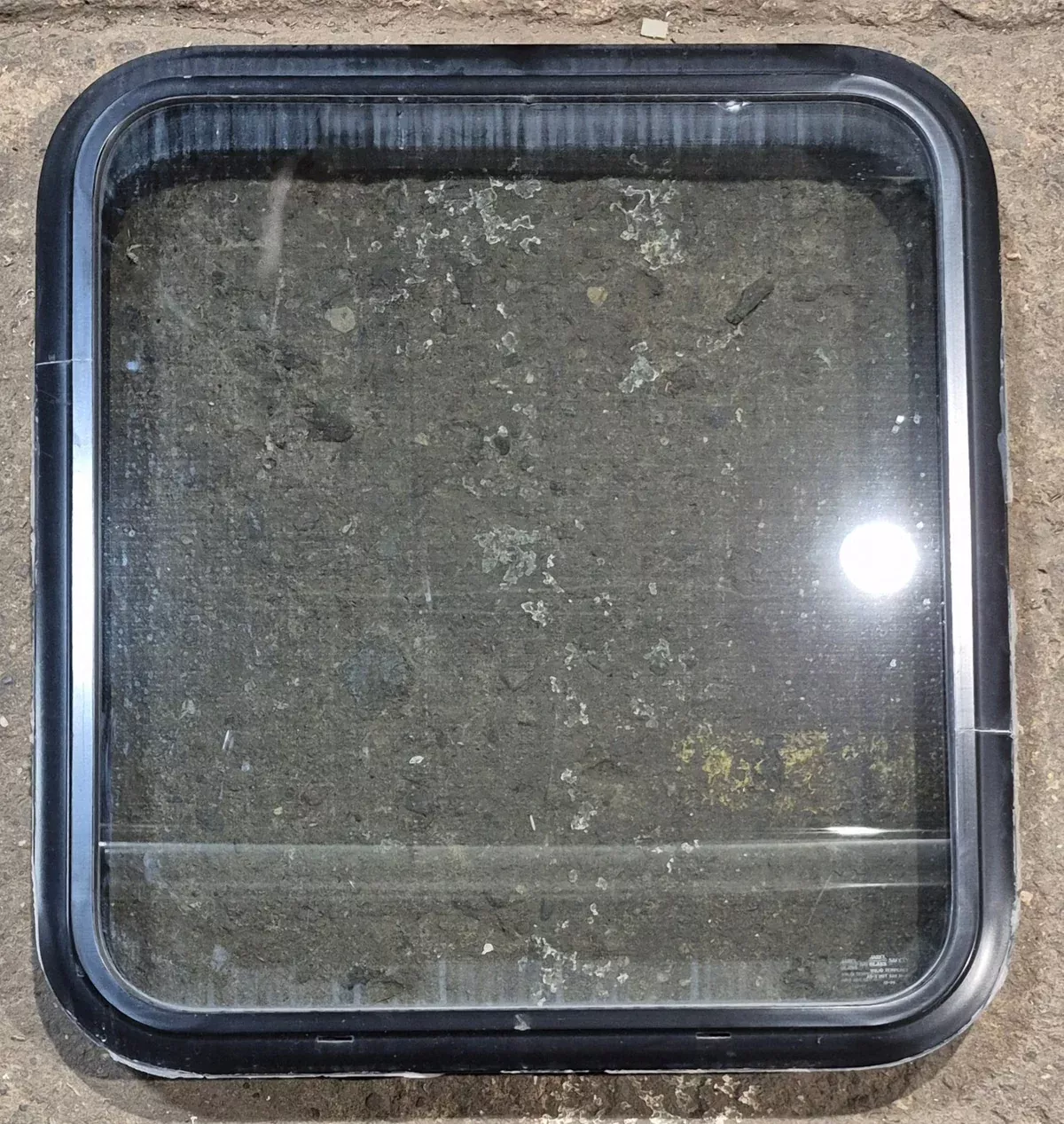 Used Black Radius Non Opening Window : 23 3/4″ W x 26″ H x 2″ D