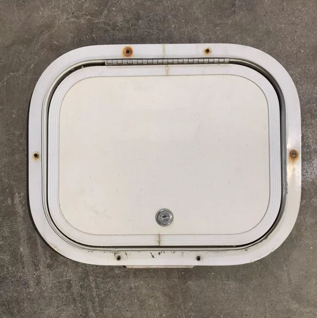 Used Radius Cargo / compartment Door 11 3/4″ W x 9 1/4″ L x 1/2″ D