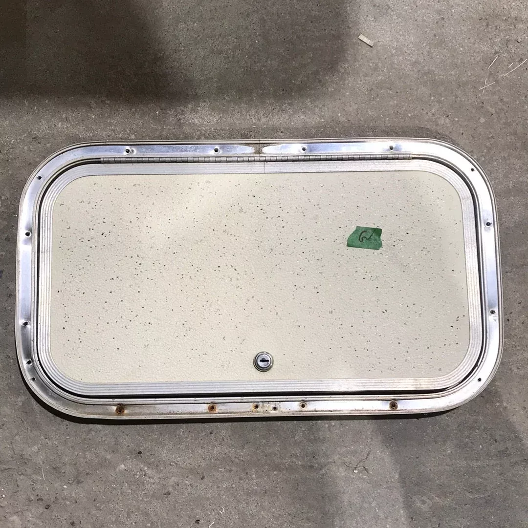 Used Radius Cargo / compartment Door 19 3/4′ W x 10 3/4″ H x 1/2″ D
