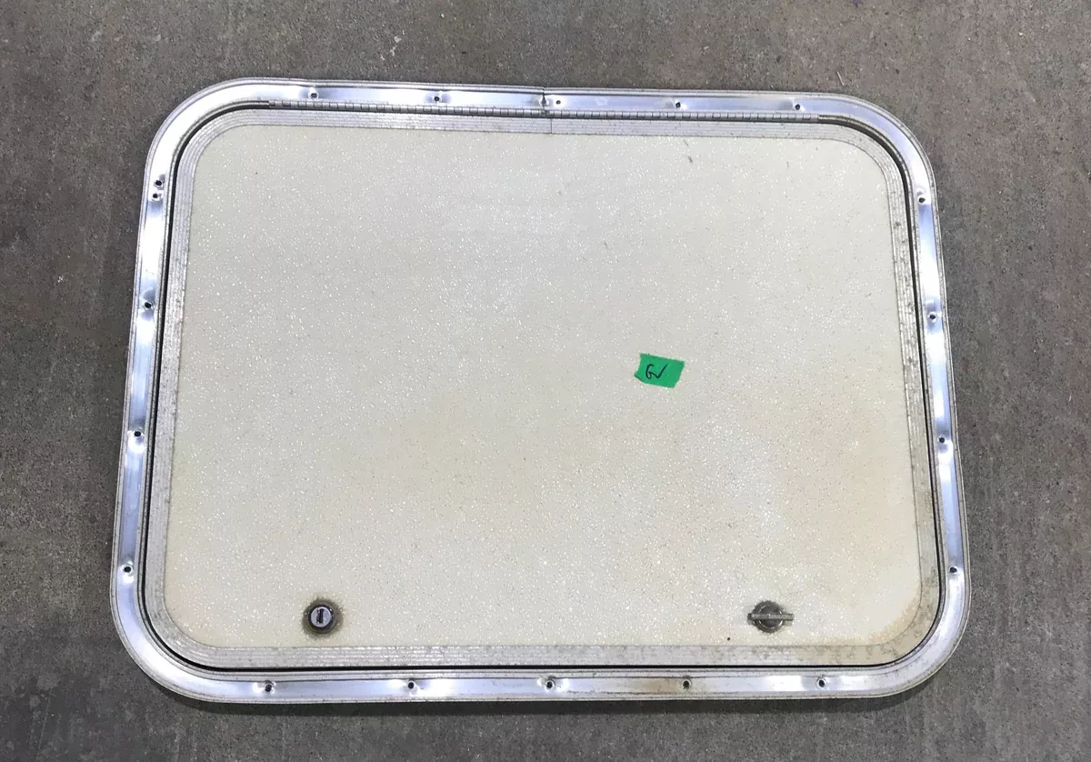 Used Radius Cargo / compartment Door 24″ W x 17 1/2″ H