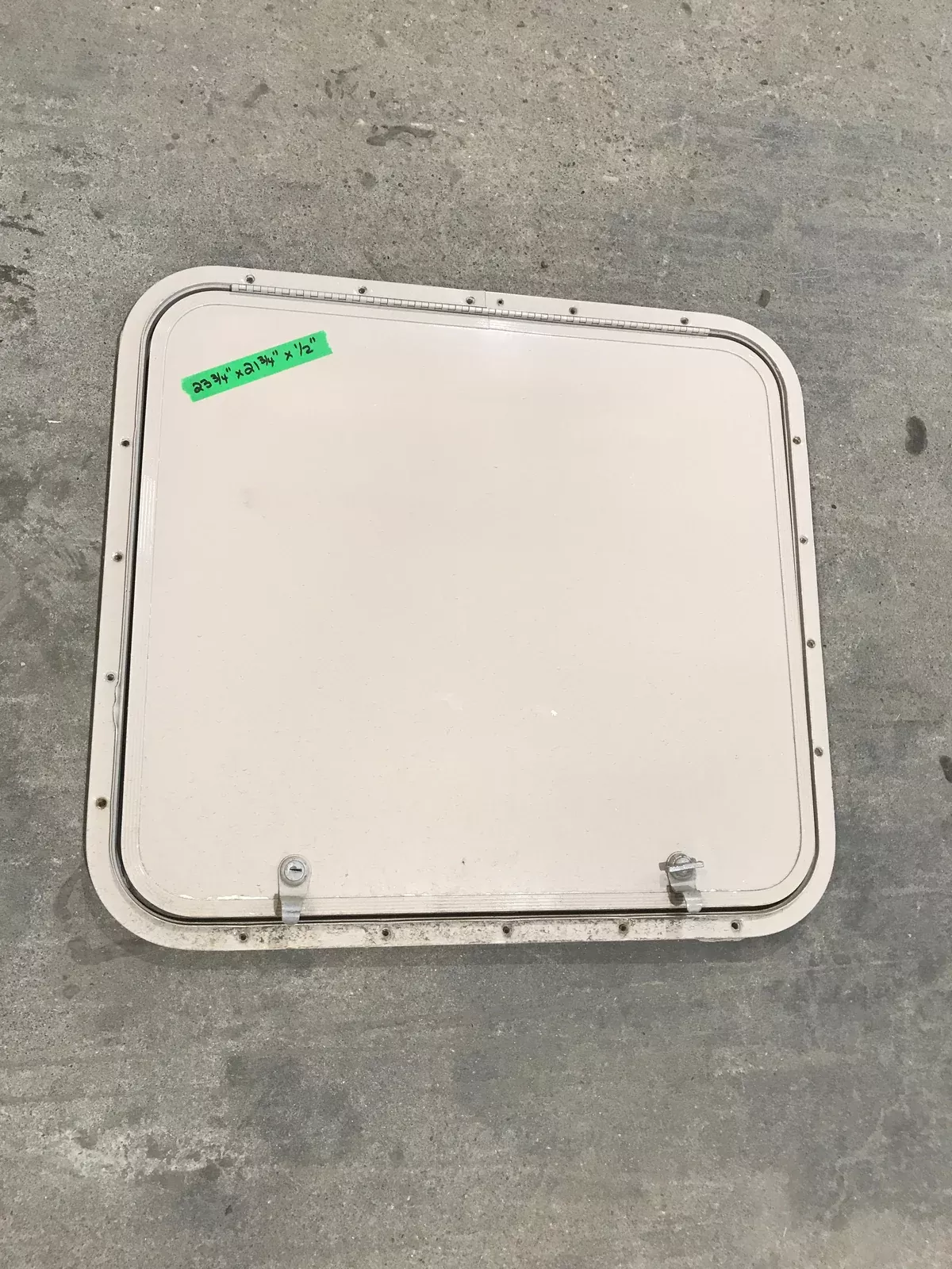 Used Radius Corner cargo door23 3/4″ Wx 21 3/4″ H x1/2″ D